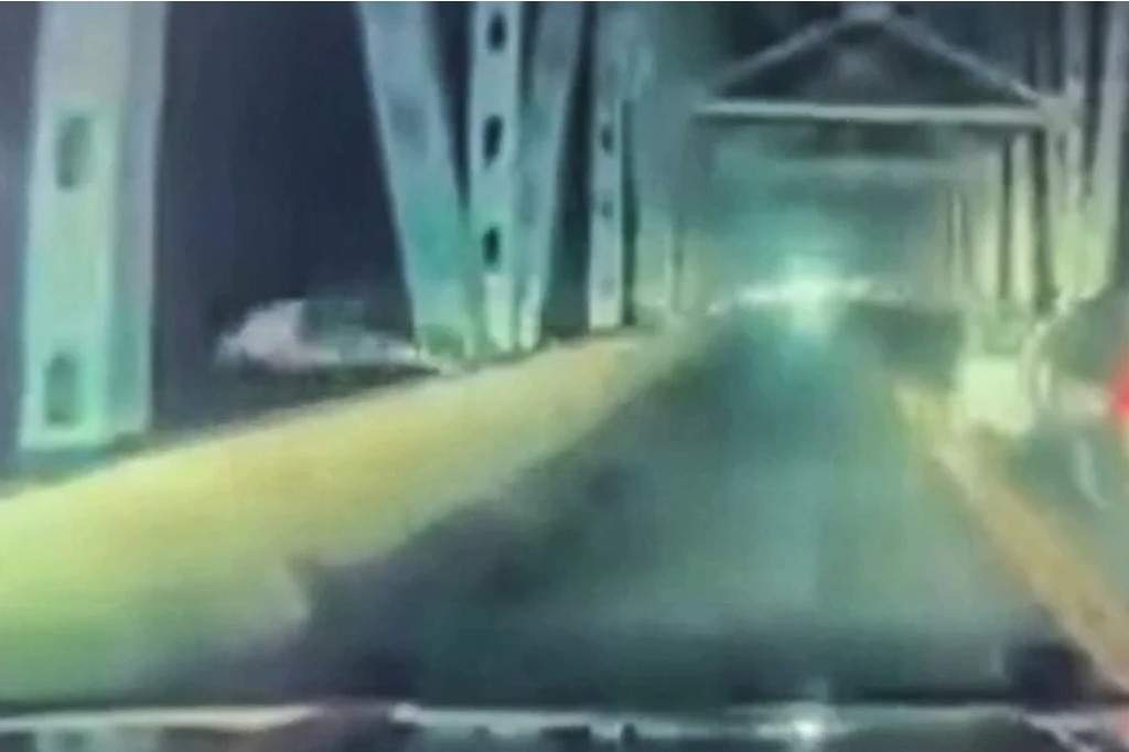 A driver jumped headfirst off a bridge in Kimberling City, Missouri, in an attempt to avoid a police chase on July 18.