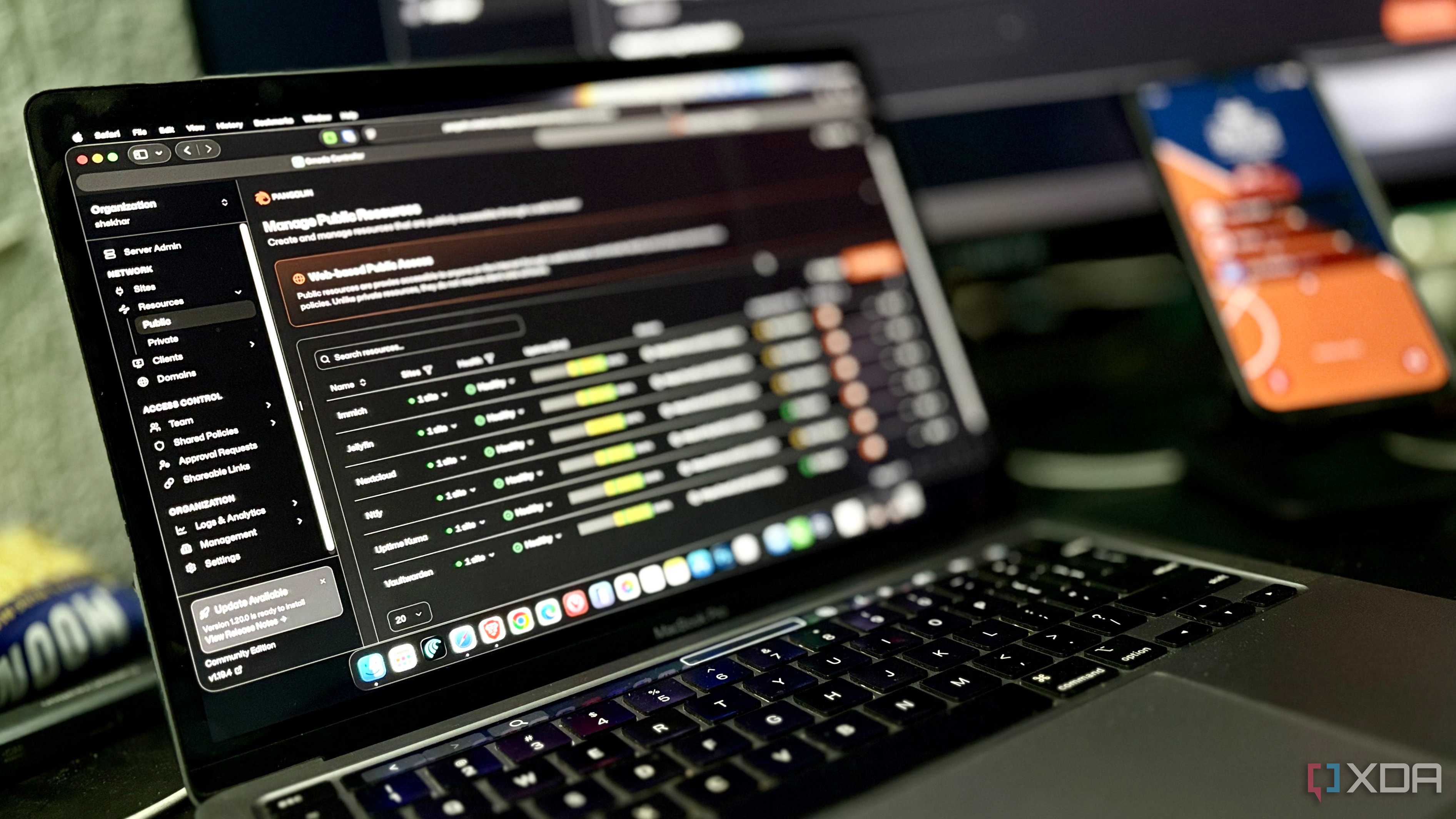 Laptop screen showing Pangolin's public resources dashboard with homelab services listed as healthy
