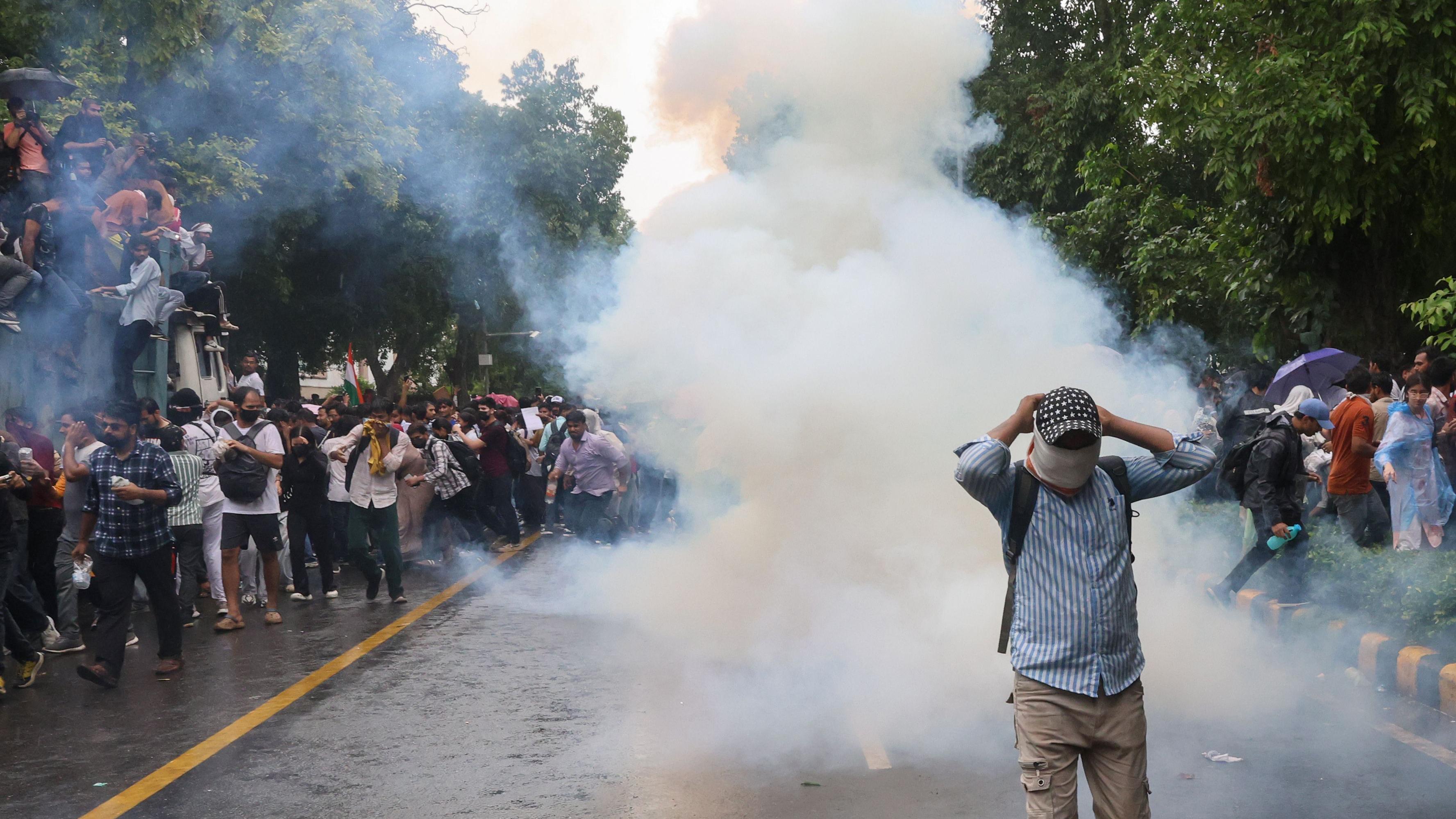 Police fired tear gas to disperse protesters as they tried to reach parliament