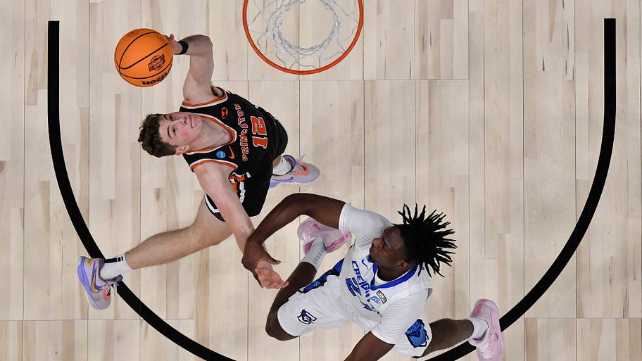 Princeton Tigers forward Caden Pierce (12) battles Creighton Bluejays forward Arthur Kaluma (24).