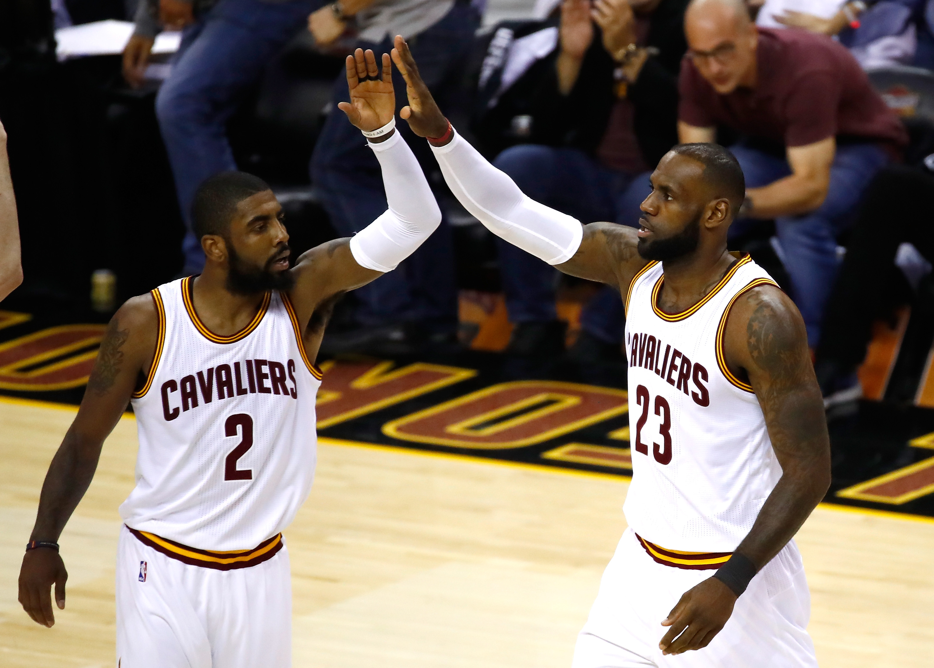CLEVELAND, OH - JUNE 09: Kyrie Irving #2 and LeBron James #23 of the Cleveland Cavaliers celebrate after a play in the first quarter against the Golden State Warriors in Game 4 of the 2017 NBA Finals at Quicken Loans Arena on June 9, 2017 in Cleveland, Ohio. NOTE TO USER: User expressly acknowledges and agrees that, by downloading and or using this photograph, User is consenting to the terms and conditions of the Getty Images License Agreement. (Photo by Gregory Shamus/Getty Images)