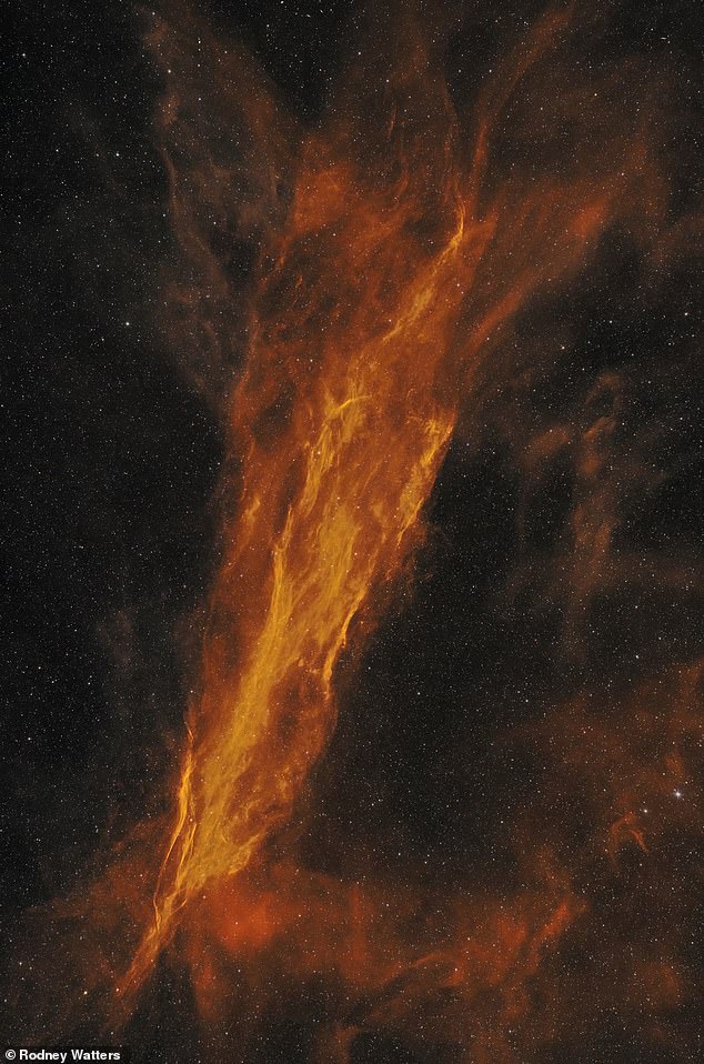 Rodney Watters' image, which looks like a Rembrandt painting of a flame, captures the nebula Gum12b in the southern hemisphere constellations of Antlia and Vela. It won an honourable mention in the Wide-Field category