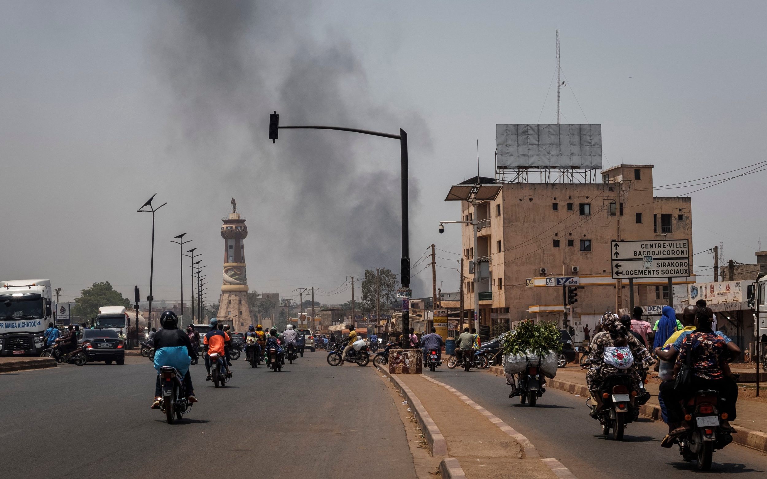 Smoke rises above buildings in Bamako, Mali following attacks