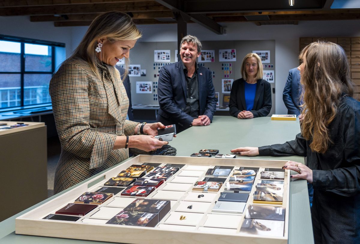 Statement earrings remain a defining element of Queen Máxima's polished and fashion-forward appearances.