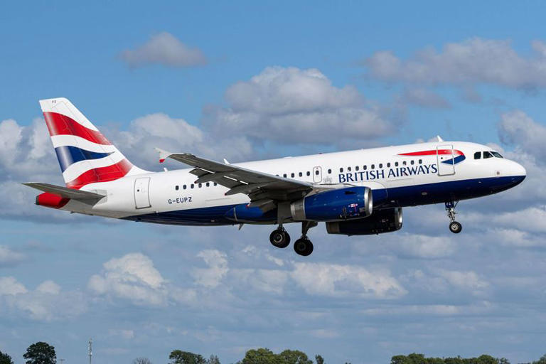 British Airways Airbus A319-100 with registration G-EUPZ on short final for runway 18R (Polderbaan) of Amsterdam Airport Schiphol