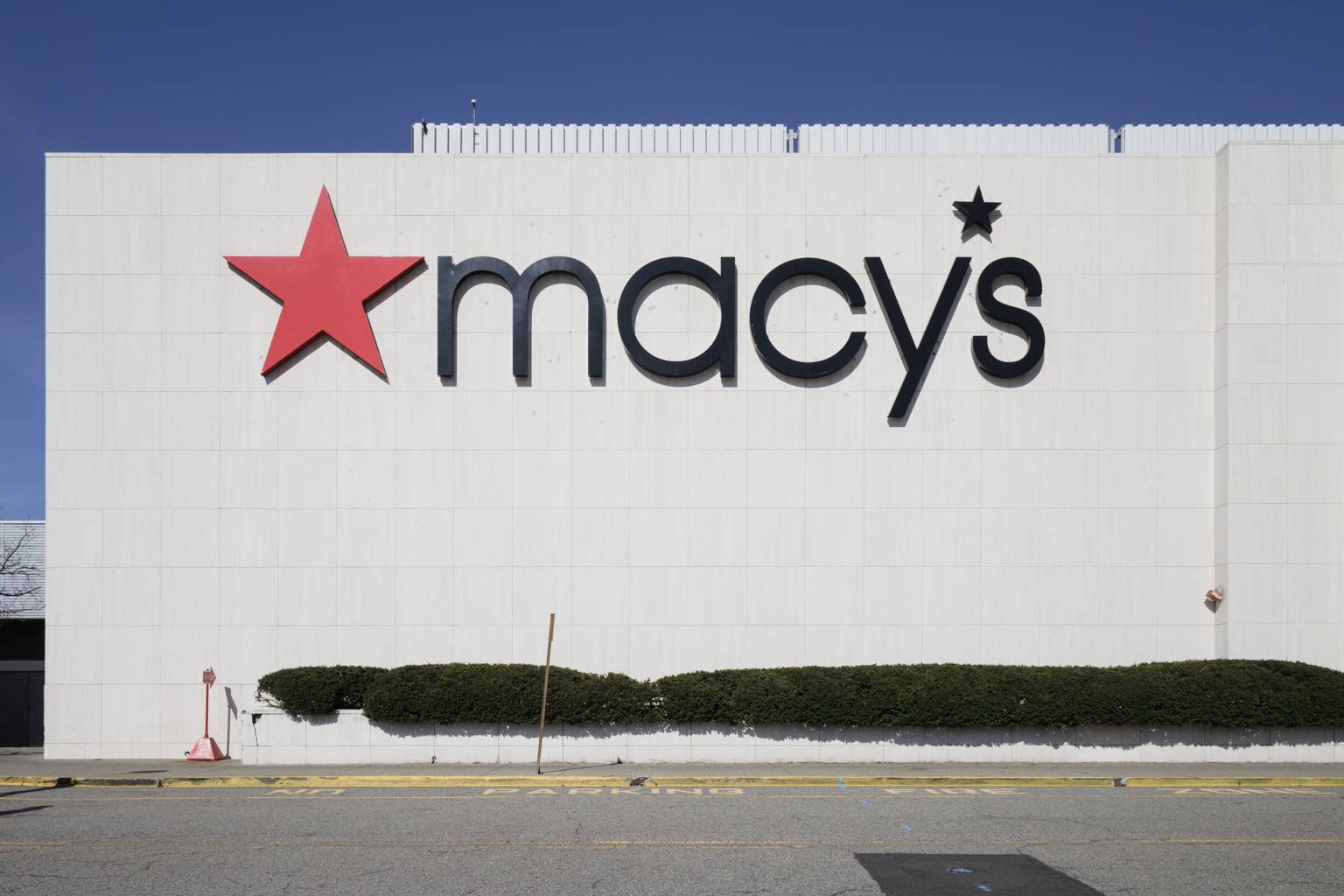 Macy’s dog print apron is 50% off and full of tail-wagging charm