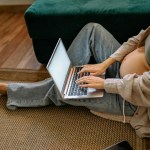 pregnant woman working on computer