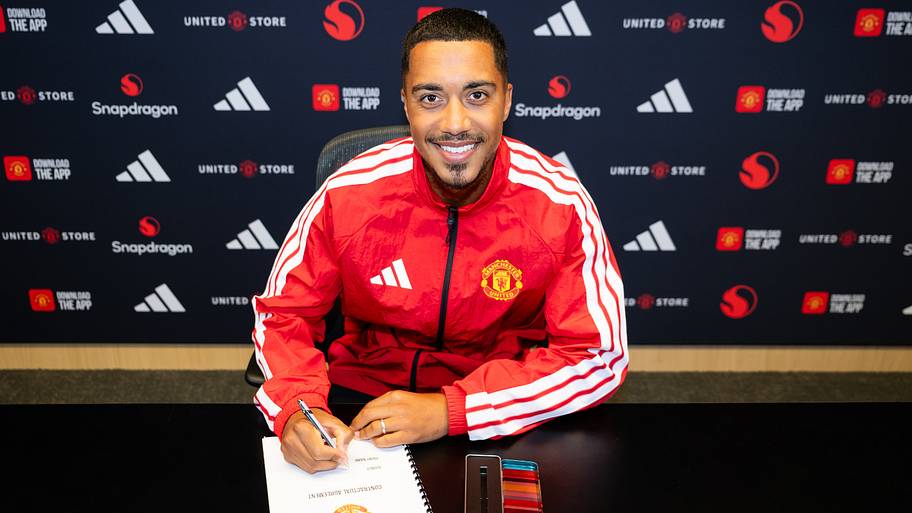 Youri Tielemans signing his Man Utd contract.