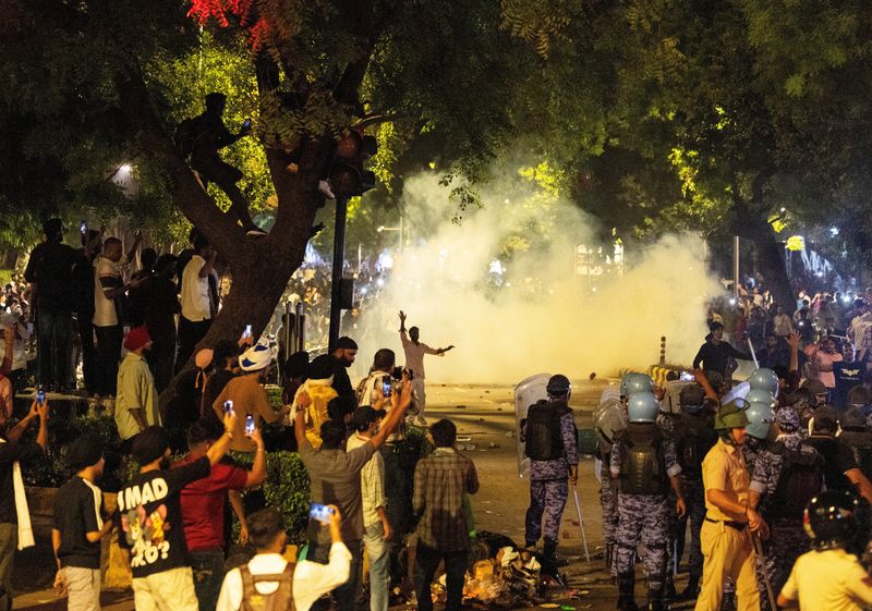 Fresh violence at Delhi youth protest demanding minister's resignation