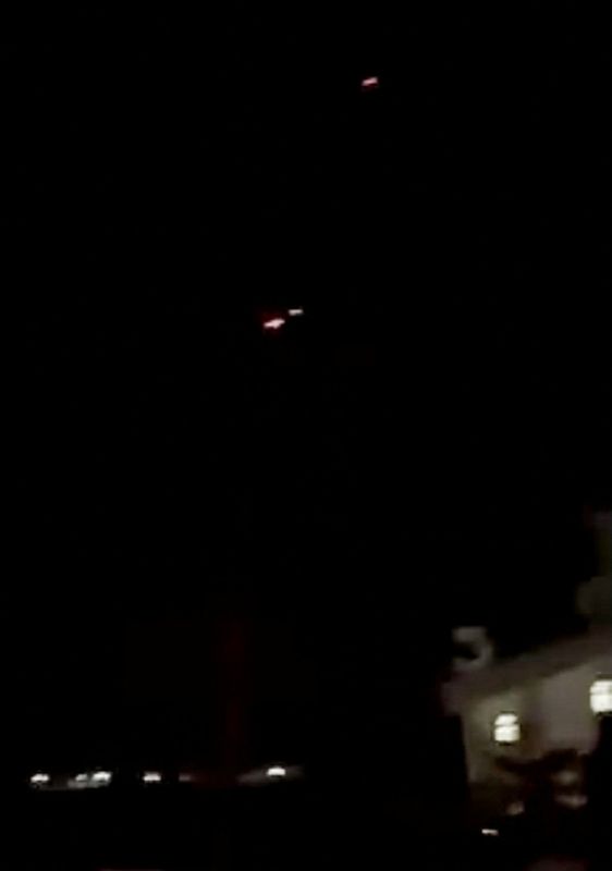 Streaks of light in the sky as Iran's Fars News Agency reports air defenses activating over Tehran