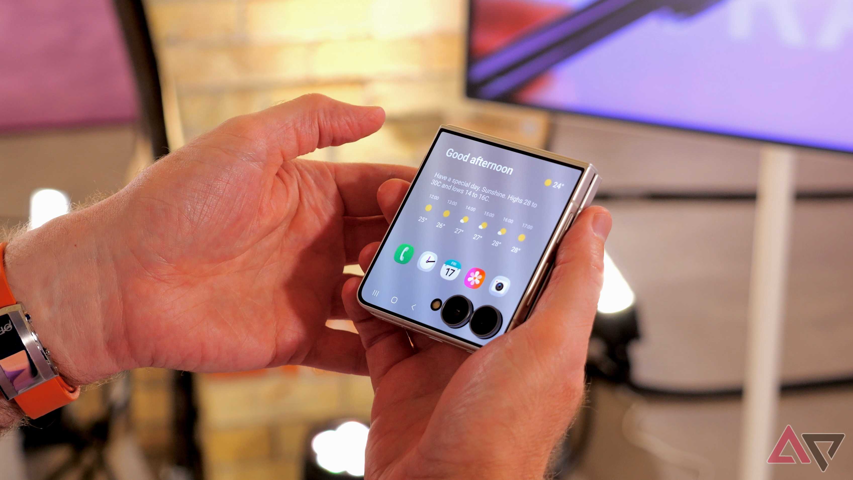 A person using the Samsung Galaxy Z Flip 8