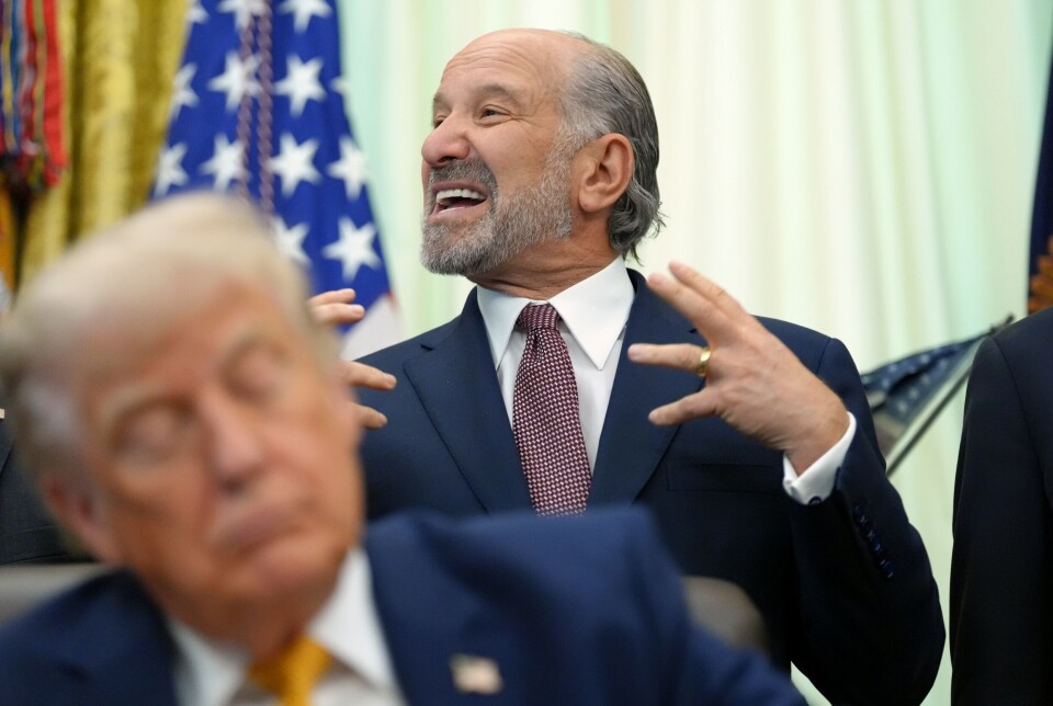 U.S. Commerce Secretary Howard Lutnick, center, speaks as U.S. President Donald Trump listens in the Oval Office of the White House during an executive order signing about quantum computing on June 22 in Washington.