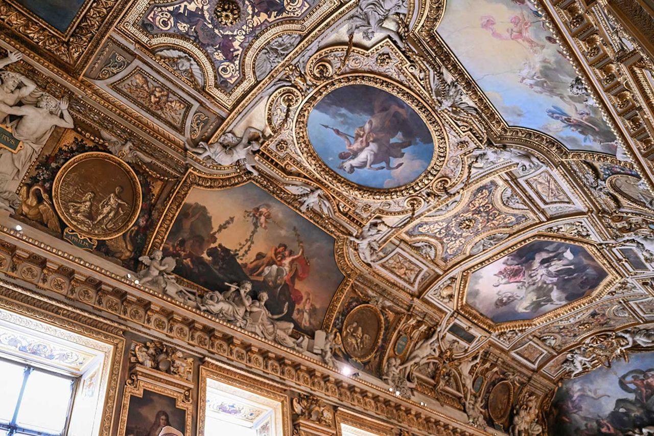 A visitor looks on during the reopening to the public of the Apollo Gallery, where French crown jewels worth 88 million euros were stolen in 2025 in a brazen heist, at the MusÃ©e du Louvre in Paris on July 22, 2026.