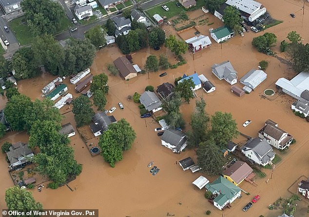 Homes as seen inundated with floodwaters. West Virginia suffered major flooding after Tropical Storm Bertha battered the Gulf Coast on Wednesday