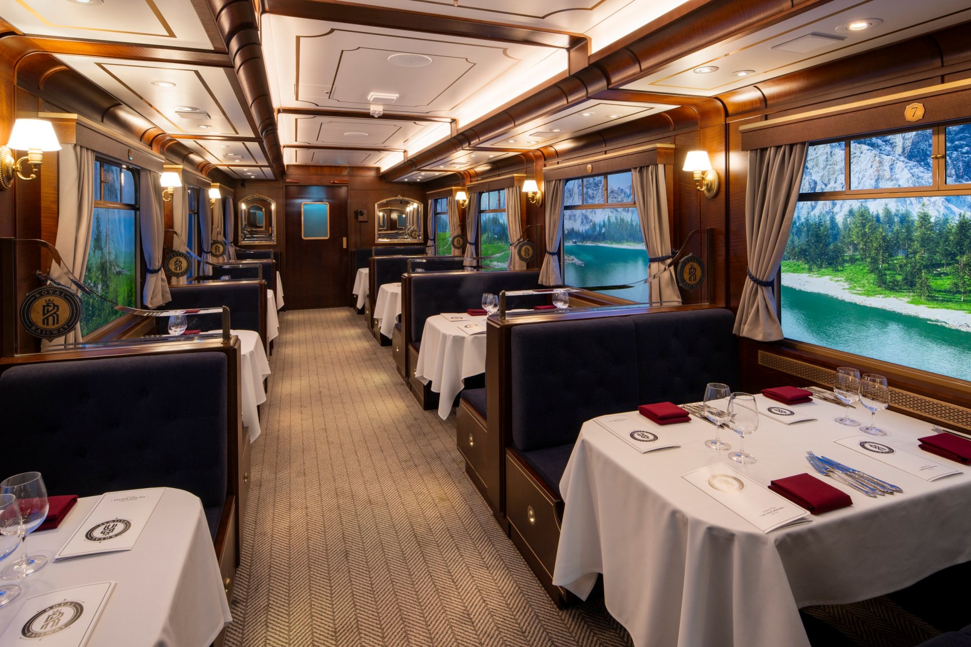 The interior of a 'vintage train cabin' style room, on the Royal Caribbean's Legend of the Seas cruise ship.