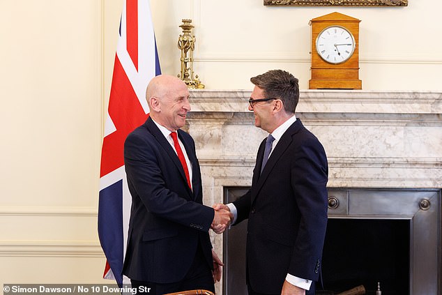 Mr Burnham with his newly appointed Chancellor John Healey. The Chancellor said: said : 'Pubs, clubs and live music venues are at the heart of communities across the UK'