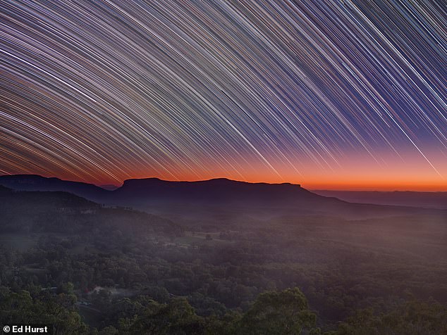 This stunning sunrise image by Ed Hurst, taken in the world's second largest canyon, shows a sky full of star trails. 'Pantoneys Crown' got an honourable mention in the Nightscapes category