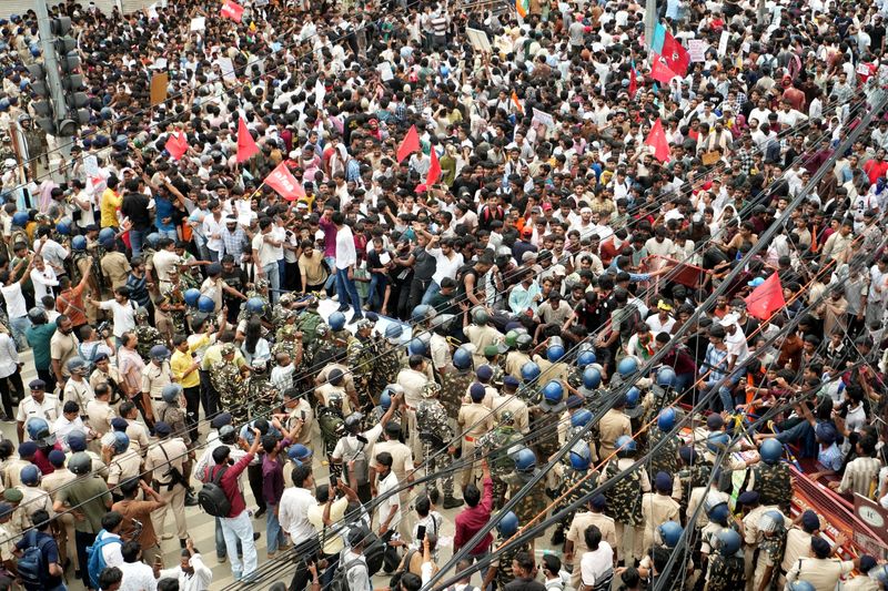 Supporters of All India Students' Association gather during a protest, in Patna