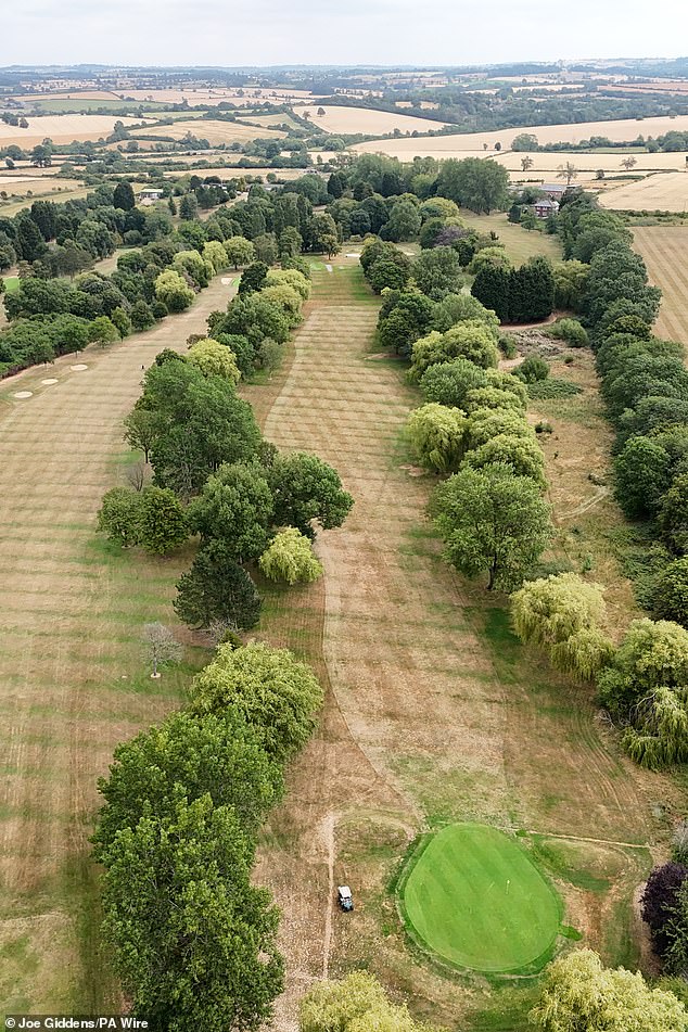 Parched fairways at Scraptoft Golf Club in Leicestershire yesterday as dry weather continues