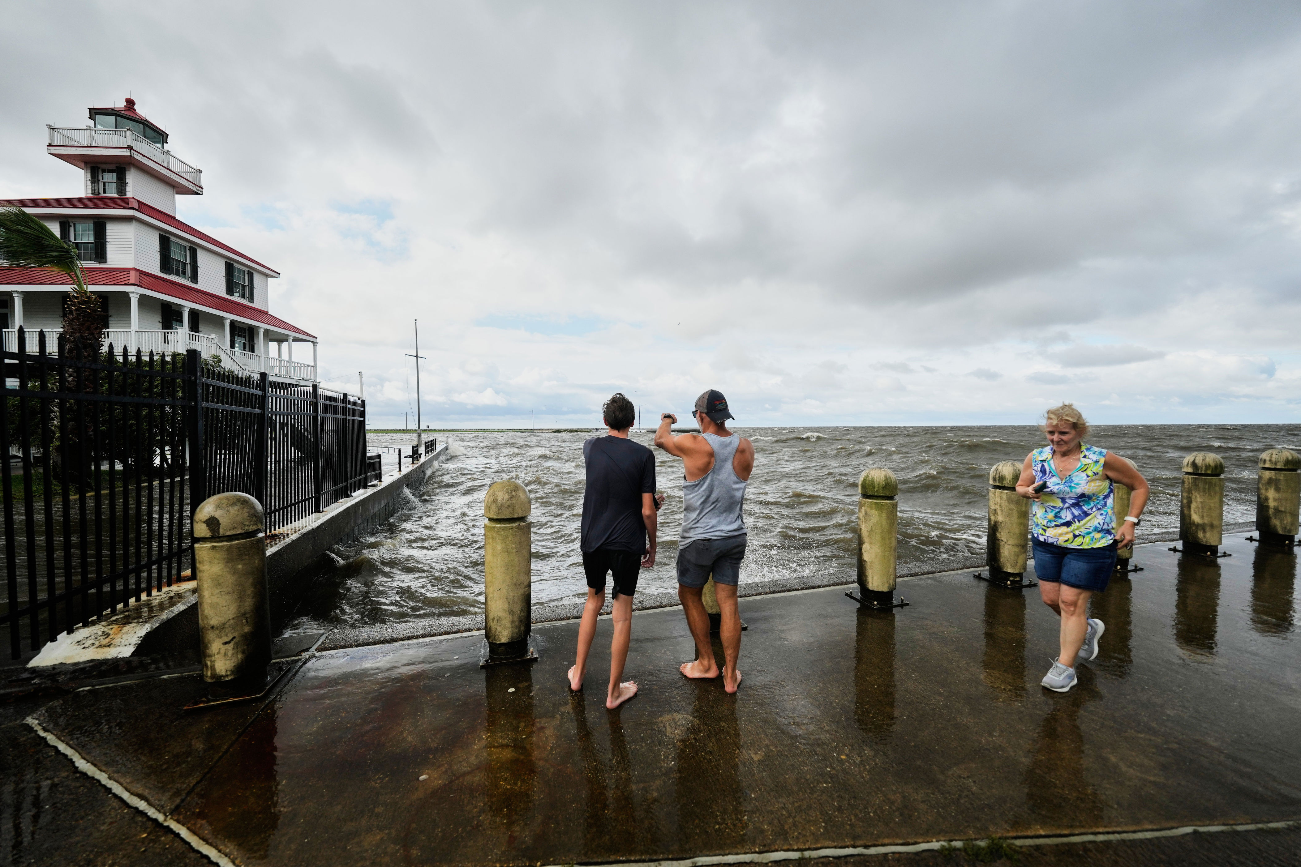 Parks, piers and some low-lying roads were shut down along the coast as wind and storm surge posed the primary threats to the Deep South states (AP Photo/Gerald Herbert)