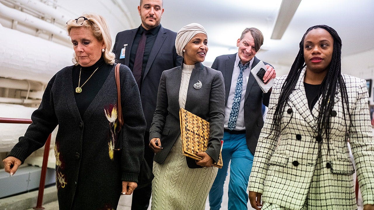 Summer lee and Ilhan Omar walk on Capitol Hill