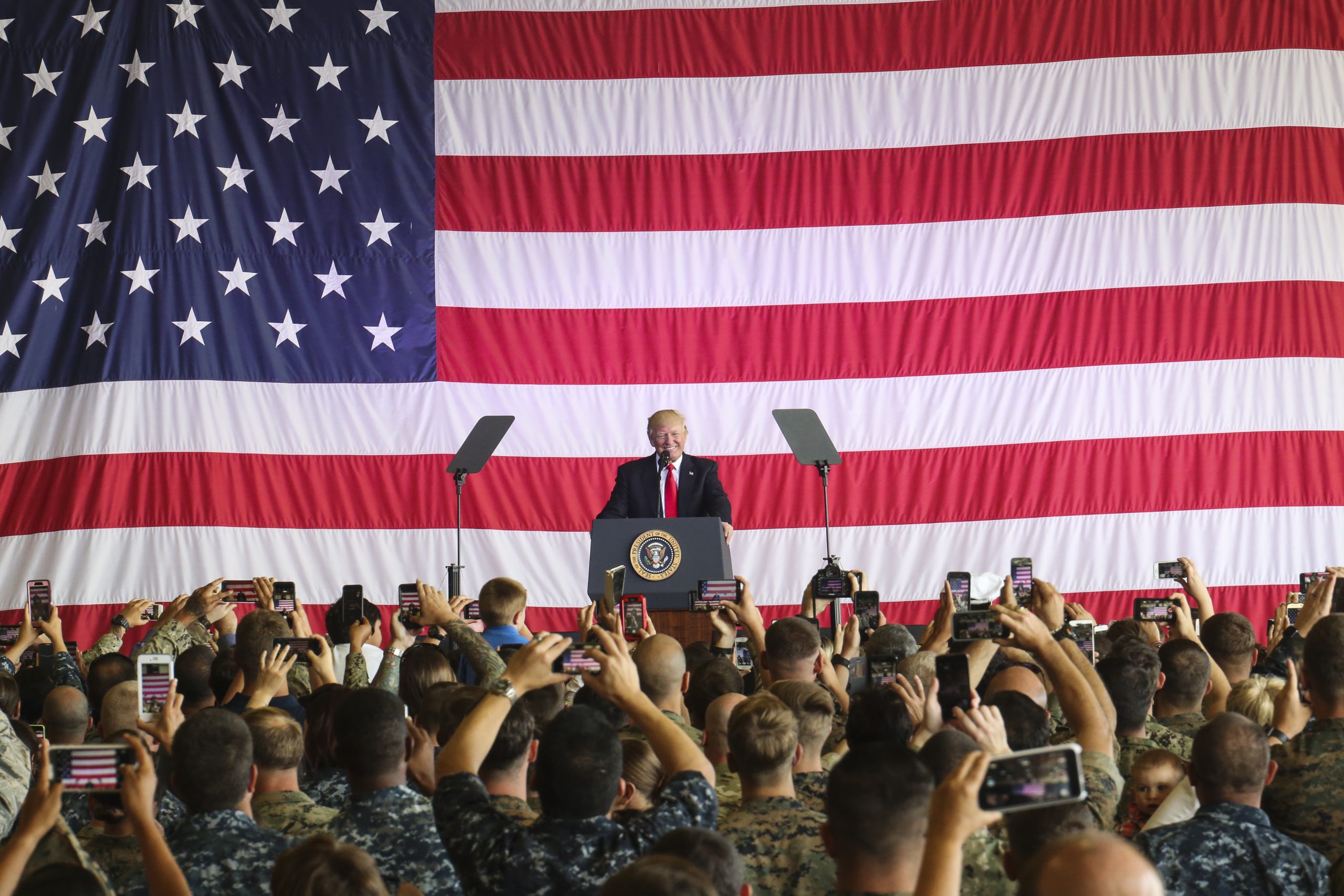 Trump visits Dover for four fallen service members as Iran warning ...
