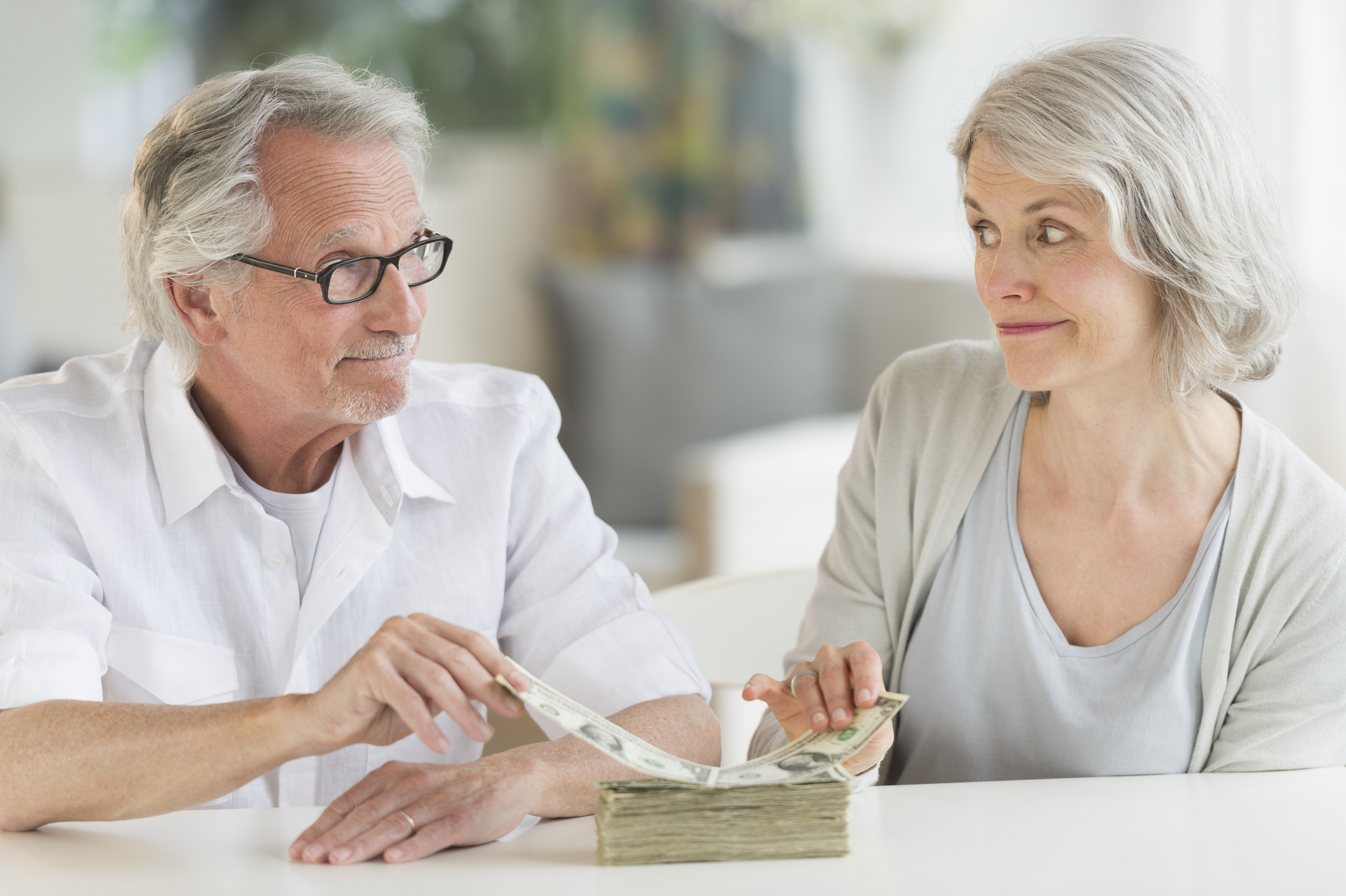 Couple counting money