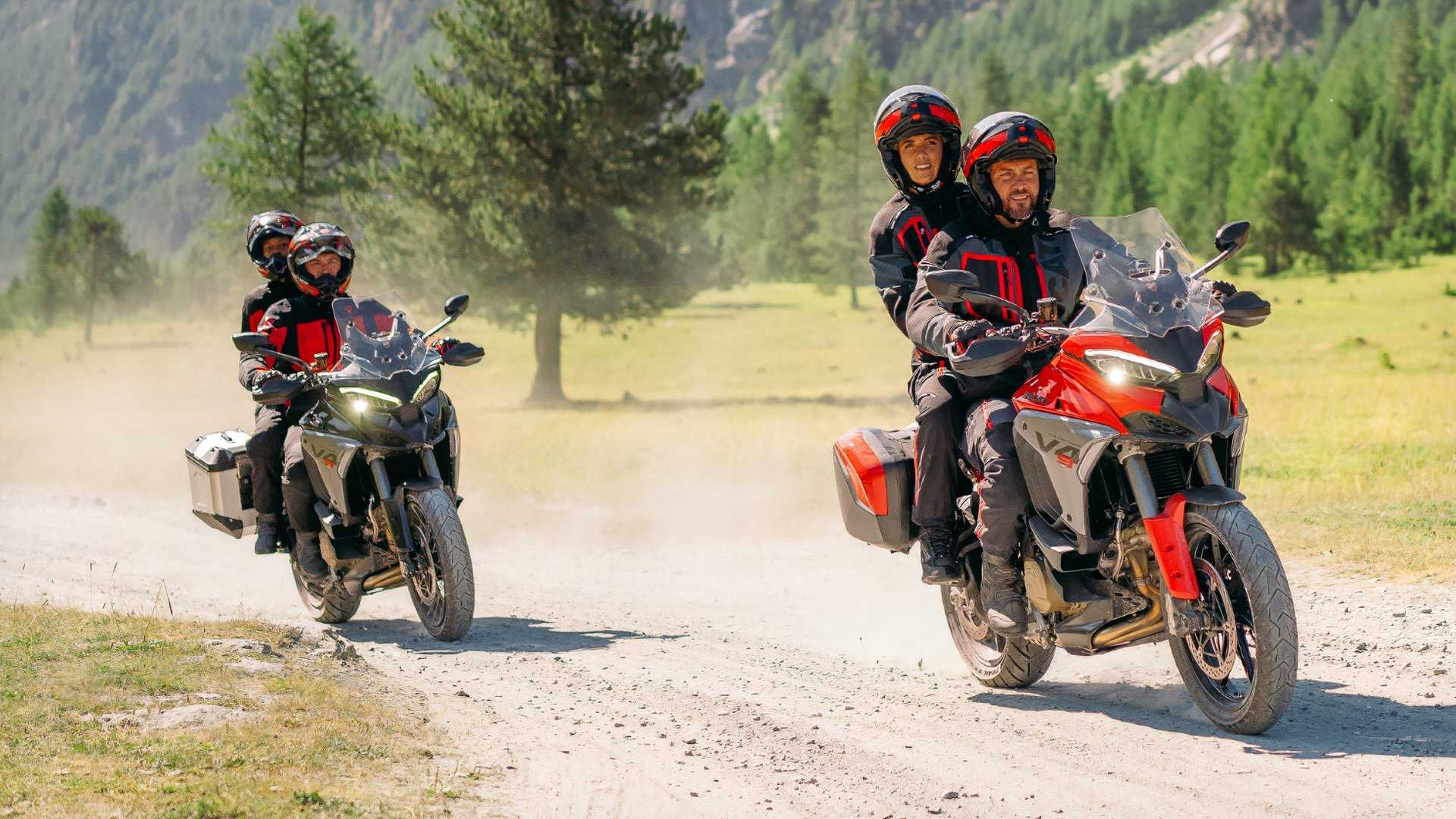 Two riders with pillion on Ducati Multistrada V4 S in countryside