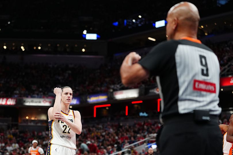 Clark urges the referee to call a foul