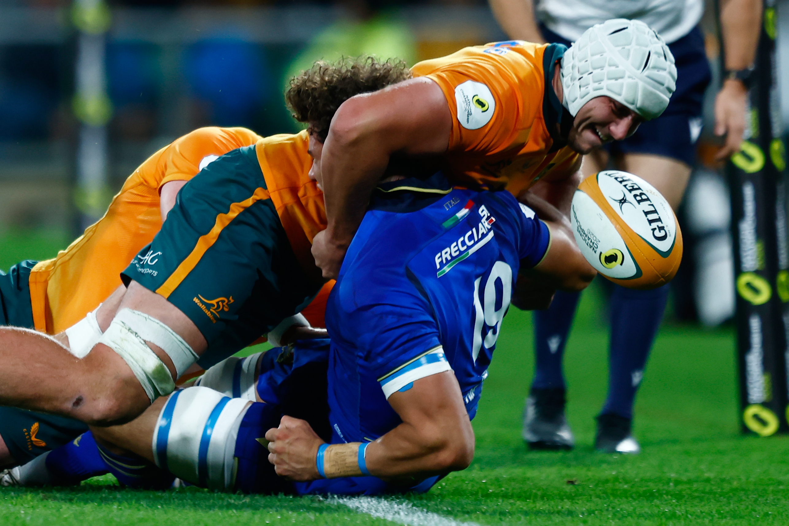 Italy's Andrea Zambonin, right, is tackled high by Australia's Josh Canham during their Nations Championship rugby international test match in Perth, Australia, Saturday, July 18, 2026. (AP Photo/Gary Day)