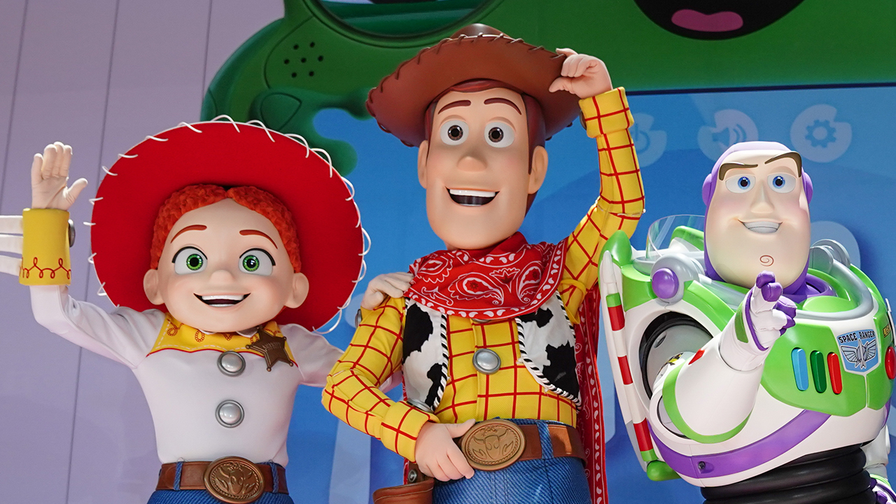 Toy Story characters Jessie, Woody and Buzz Lightyear pose at a red carpet launch event for 'Toy Story 5' in London on May 28, 2026.