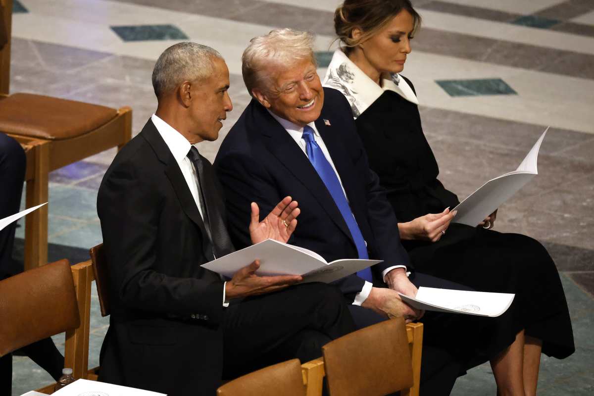 U.S. President-elect Donald Trump speaks with former U.S. President Barack Obama as Melania Trump looks on during the state funeral for former U.S. President Jimmy Carter at Washington National Cathedral on January 09, 2025 in Washington, DC. President Joe Biden declared today a national day of mourning for Carter, the 39th President of the United States, who died at the age of 100 on December 29, 2024 at his home in Plains, Georgia. (Photo by Chip Somodevilla/Getty Images)