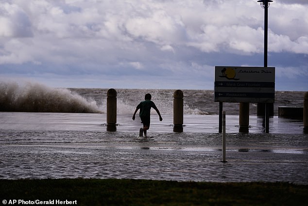 Josiah Carpenter, 8, frolicked in the floodwaters on Lakeshore Drive along Lake Pontchartrain as Tropical Storm Bertha approached