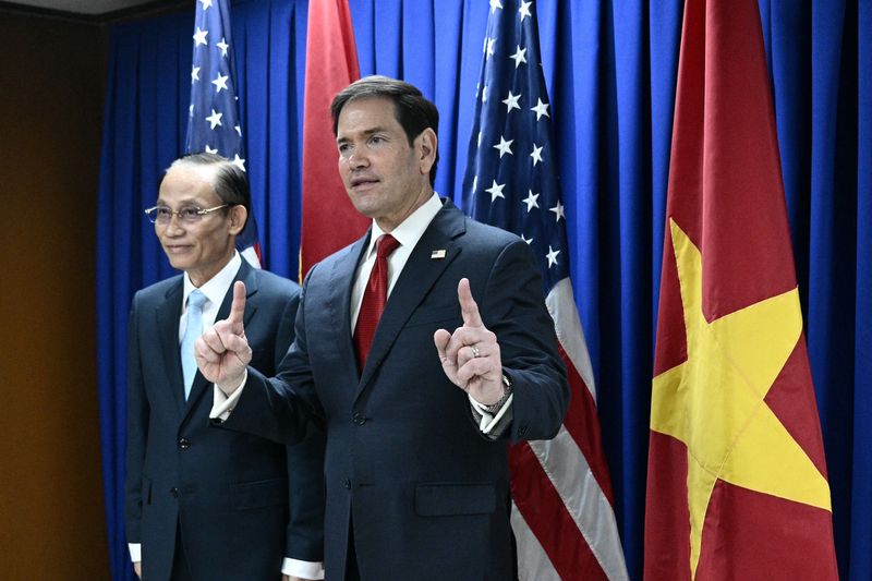 U.S. Secretary of State Marco Rubio gestures next to Vietnam Foreign Minister Le Hoai Trung before their bilateral meeting
