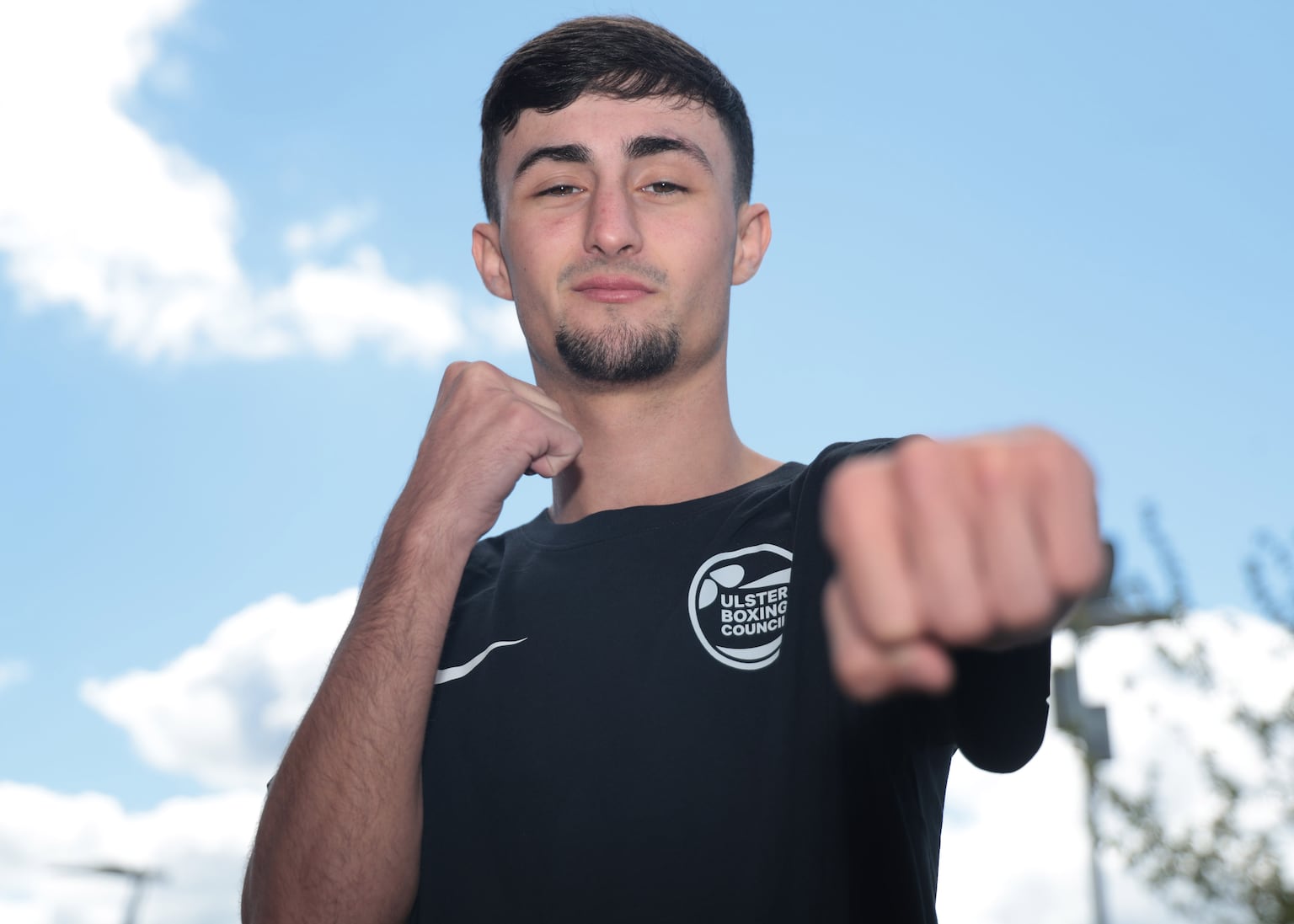Louis Rooney gets action under away as five Team NI boxers stand one win away from medal