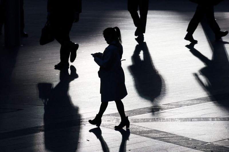 A commuter walks through the CBD in Sydney