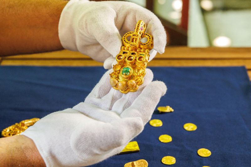 Igor Miholjek, head of research, Croatian Conservation Institute, Department of Underwater Archaeology, shows the gold buckle decorated with rubies, emeralds, and pearls, which they found in a Byzantine shipwreck near Polace on the island of Mljet