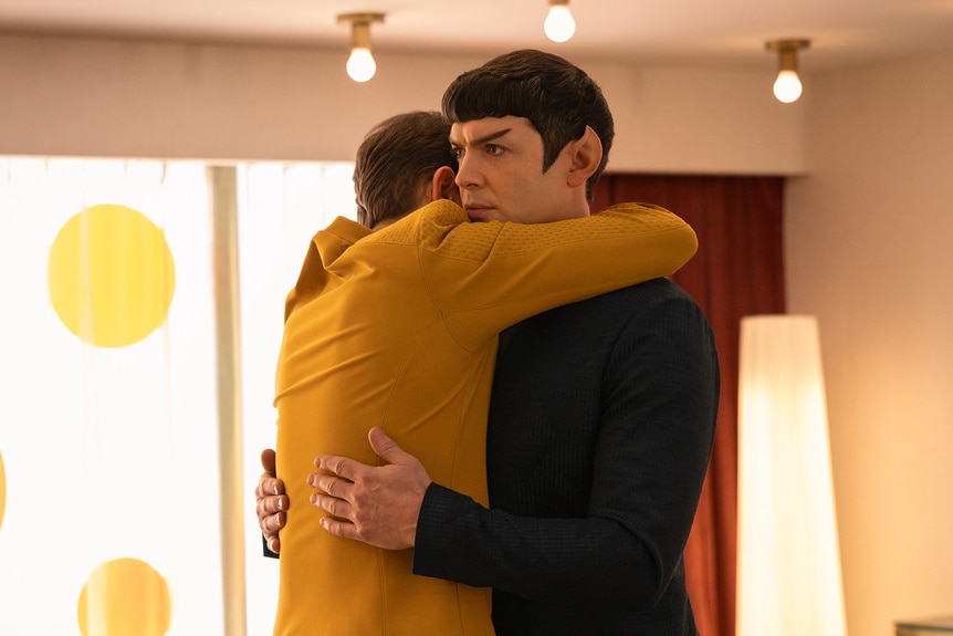 Paul Wesley as Kirk hugging Ethan Peck as Spock on Star Trek: Strange New Worlds.