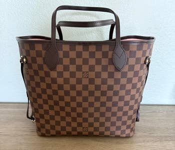 Designer checkered tote bag with leather handles
