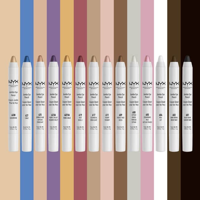 NYX Jumbo Eye Pencils displayed in various shades, arranged with vertical swatches of each color behind them