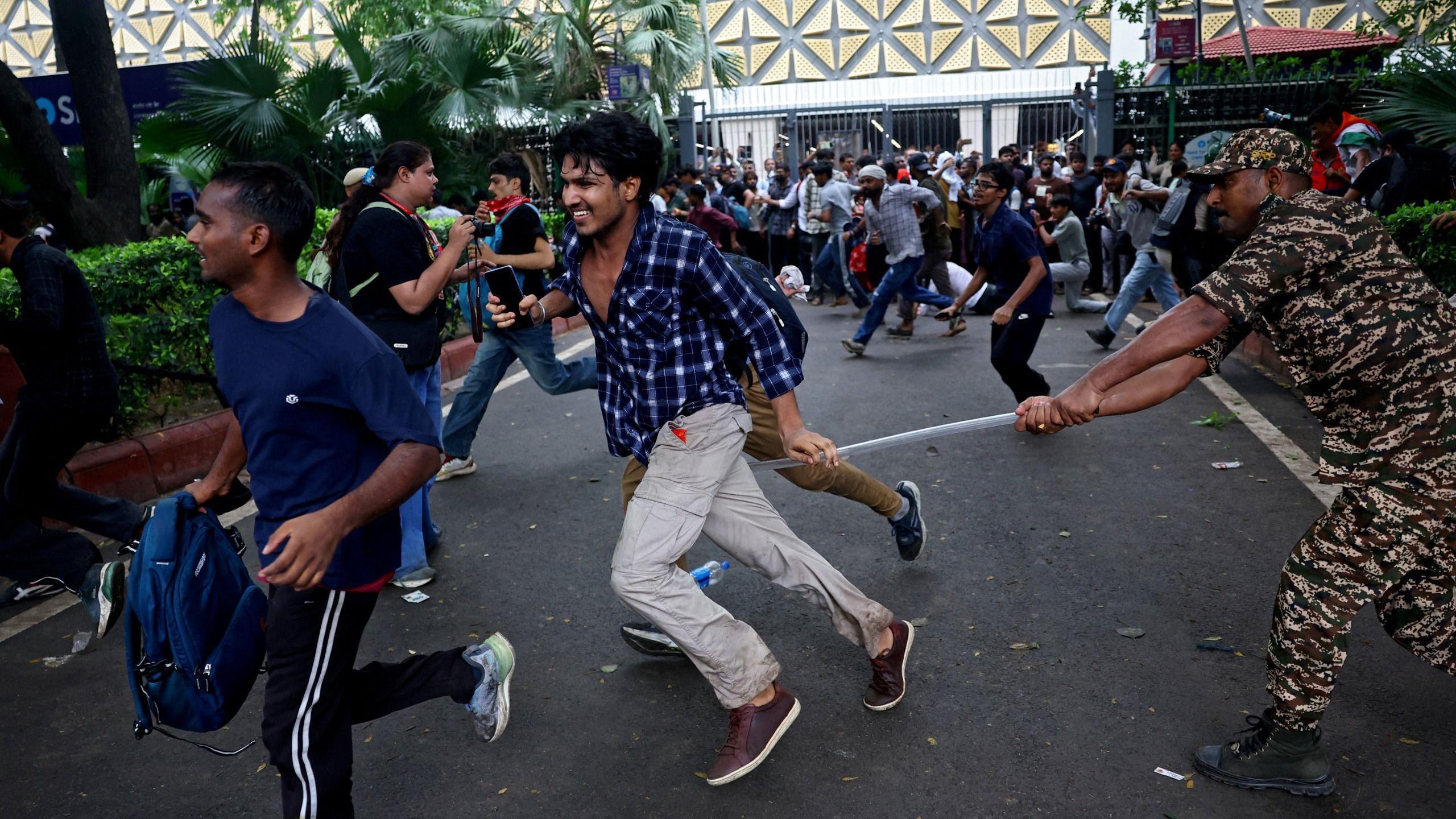 Police charged at protesters with batons and tear gas during the 20 July march