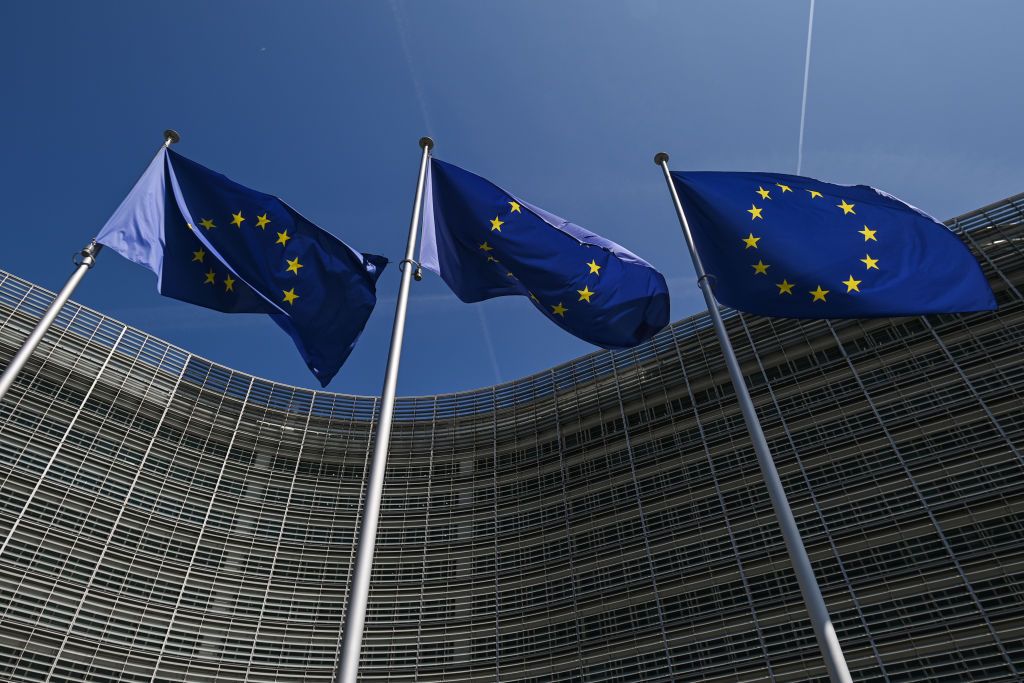 European Union flags decorates the façade of the iconic Berlaymont building, the seat of the European Commission in Brussels, Belgium, on May 31, 2023. (Artur Widak/NurPhoto via Getty Images)