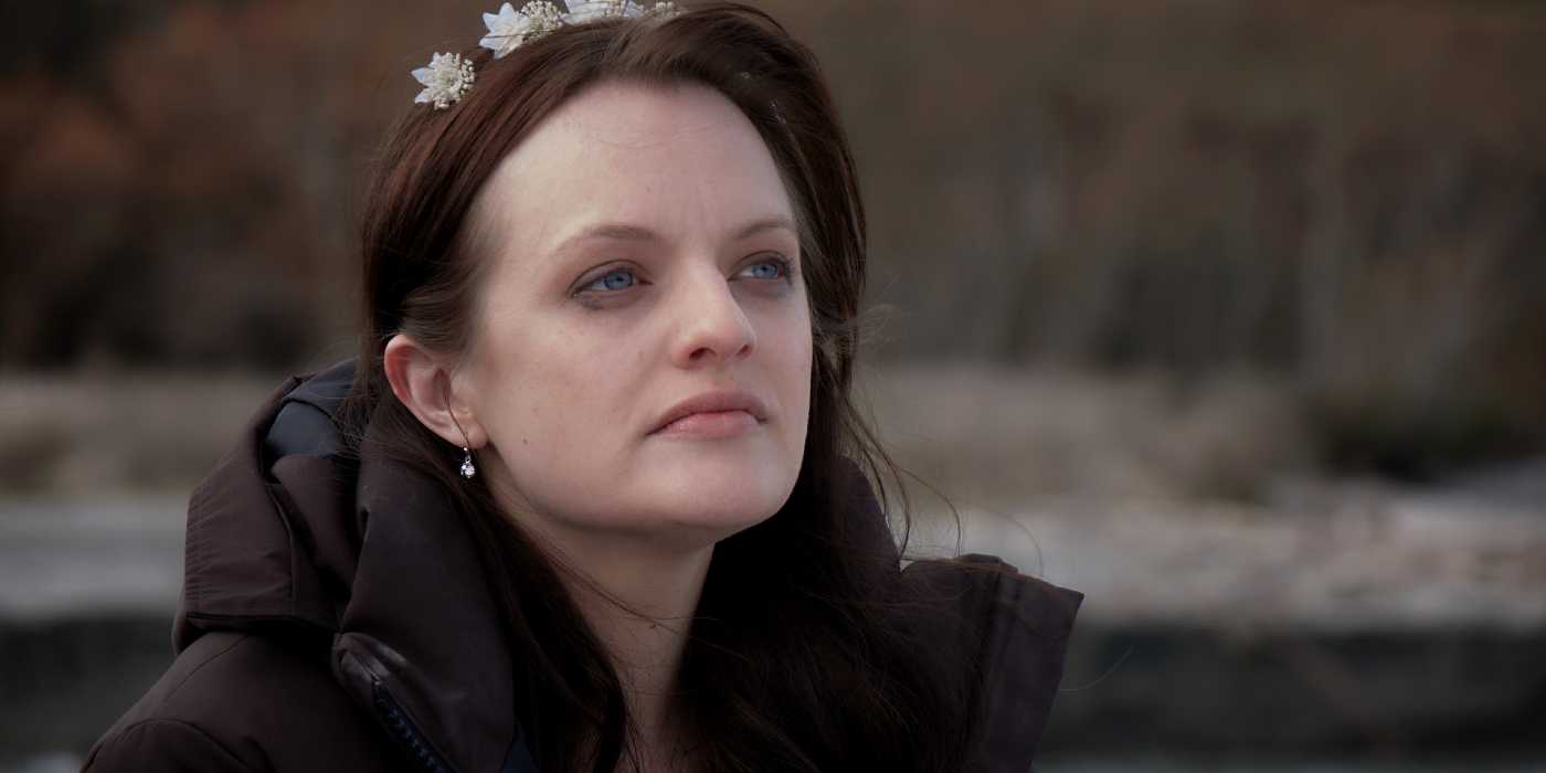 Det. Robin Griffin (Elisabeth Moss) sits at the lake with tears in Top of the Lake