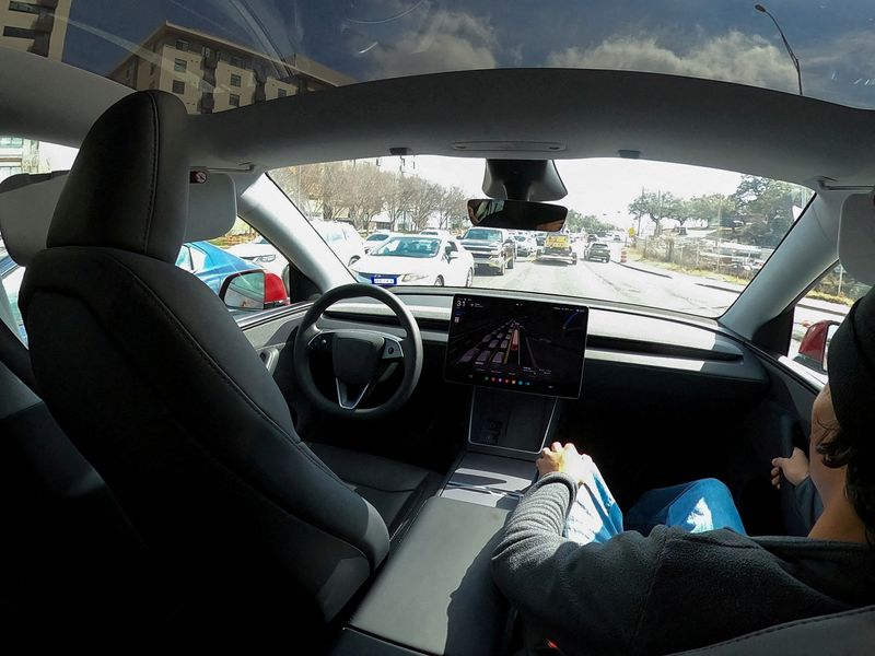 Tesla's once-bullish tone on robotaxis shifts
