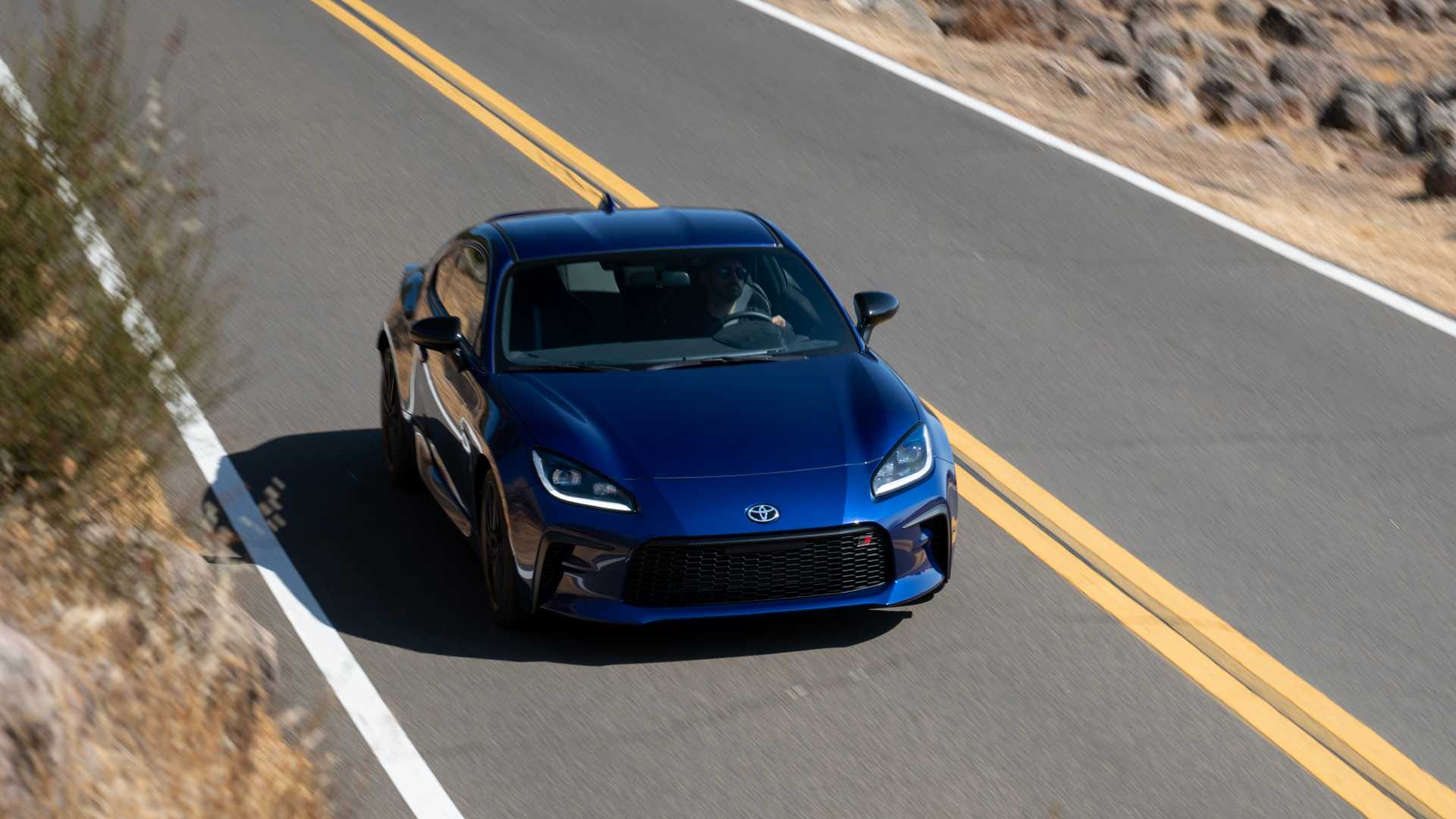 overhead view of 2027 Toyota GR86 in Trueno Blue