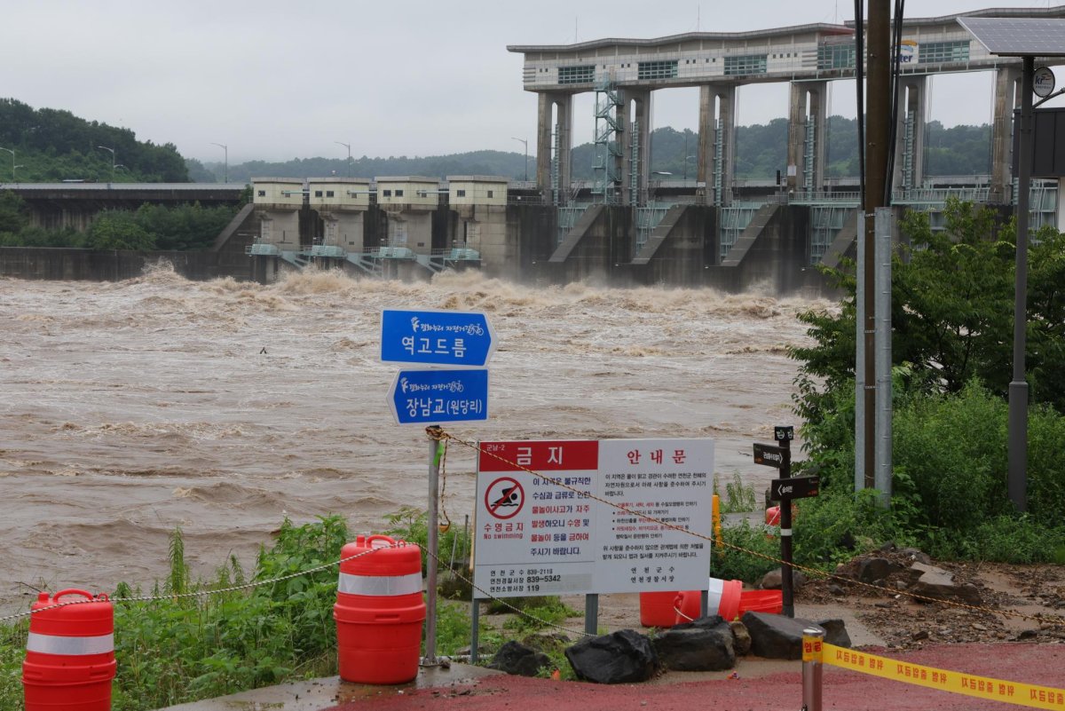 Seoul's military warned Thursday that North Korean landmines in the DMZ may have washed across the border after heavy rainfall. In this photo, water from the Imjin River is released from Gunnam Dam on Tuesday.