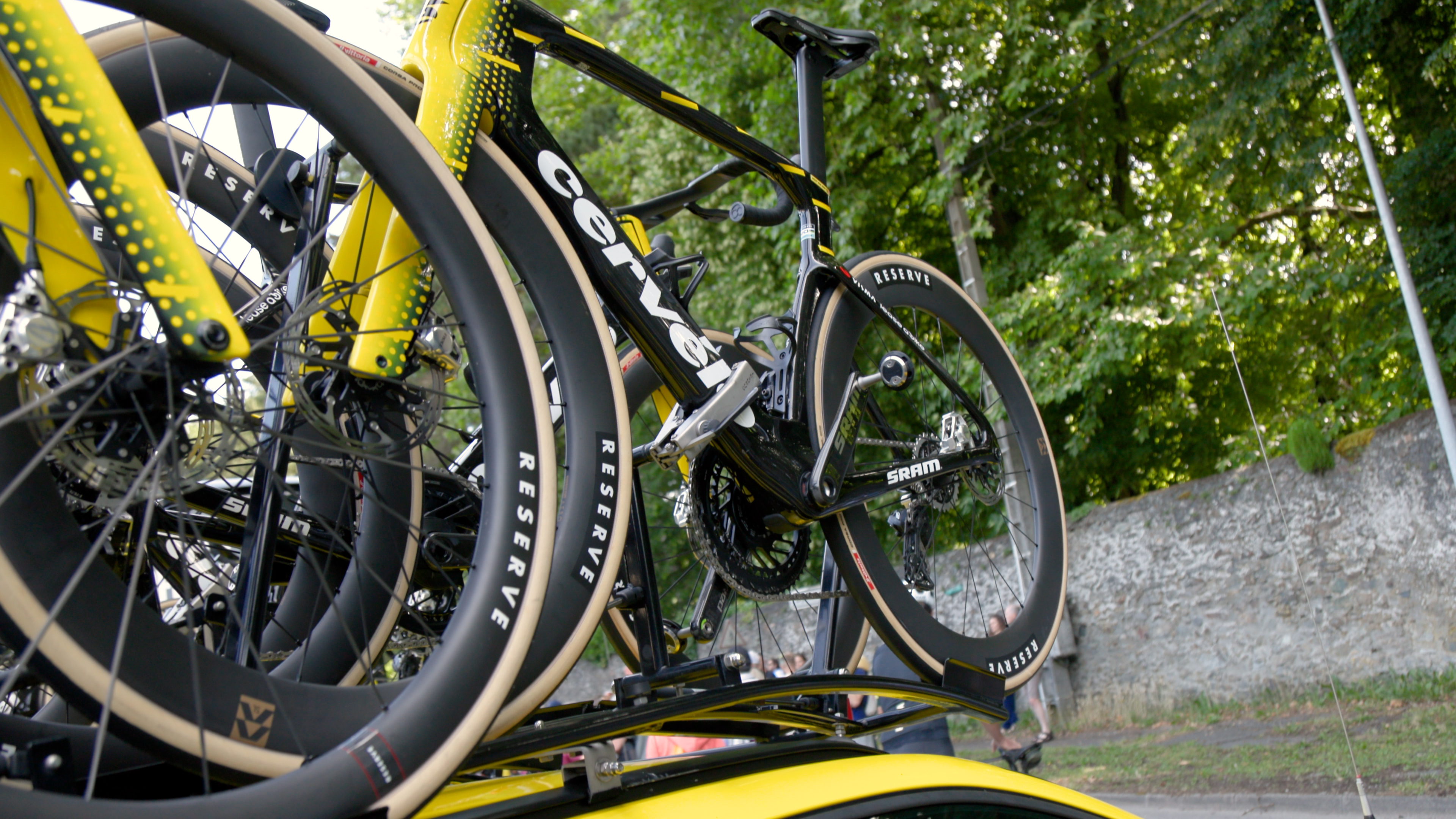 Reserve wheels mounted to the Visma Lease-a-bike bikes on top of the team car, ahead of the grand depart at the 113th Tour de France in Barcelona.