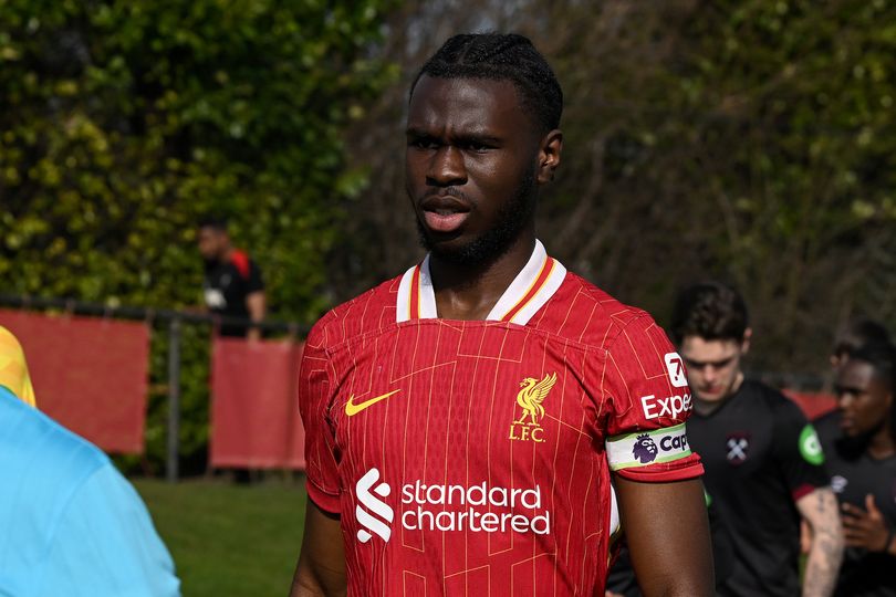 Amara Nallo leads his Liverpool team onto the pitch at The Academy in Kirkby