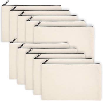 Ten beige zippered canvas pouches arranged in rows,
