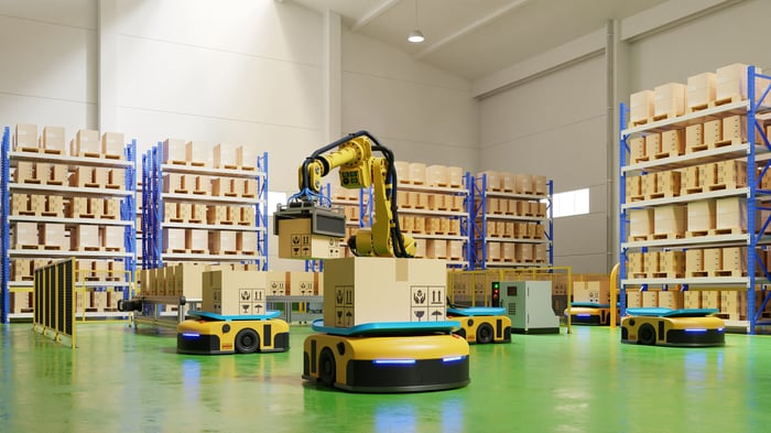 Robots moving parcels in a warehouse.